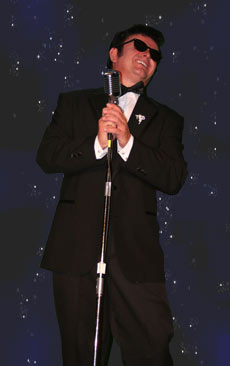 Mike Russell as Ray Charles